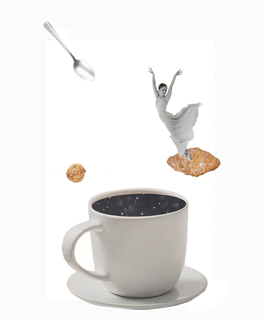 Imagen de una taza con café y una bailarina bailando sobre una galleta